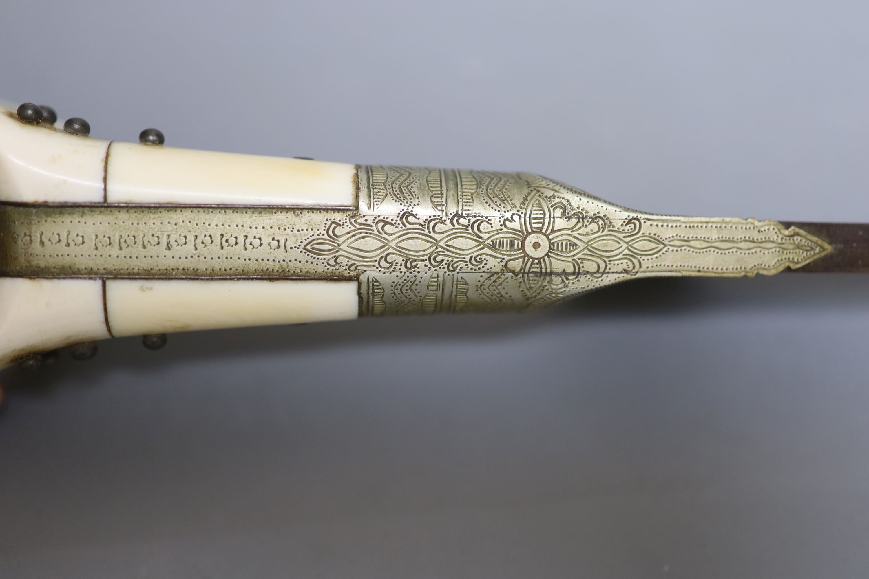 Two Indian army daggers, bone handles, one engraved 1939, with bone mounted handle, the other an ivory mounted handle